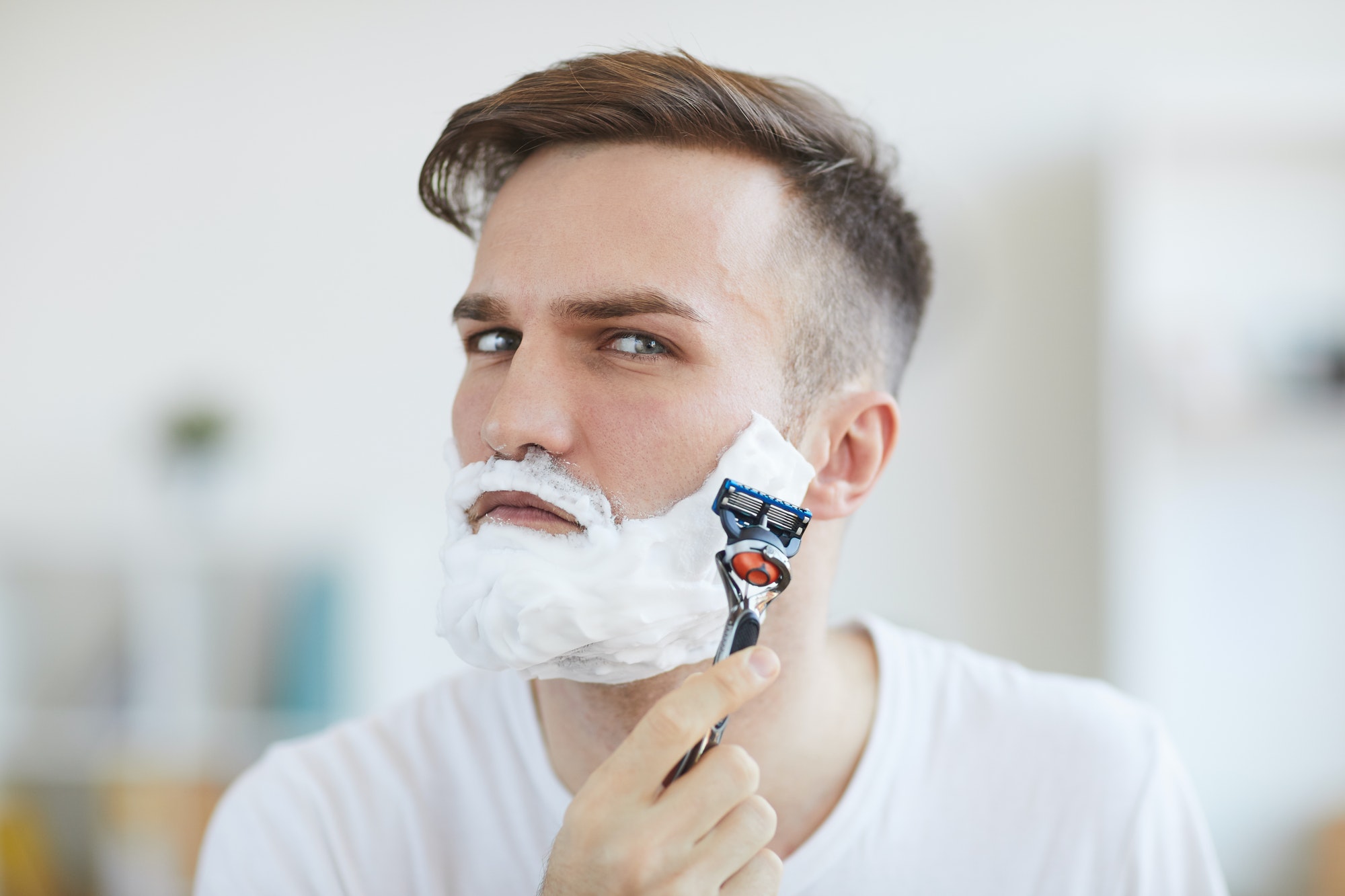 Young Man Shaving